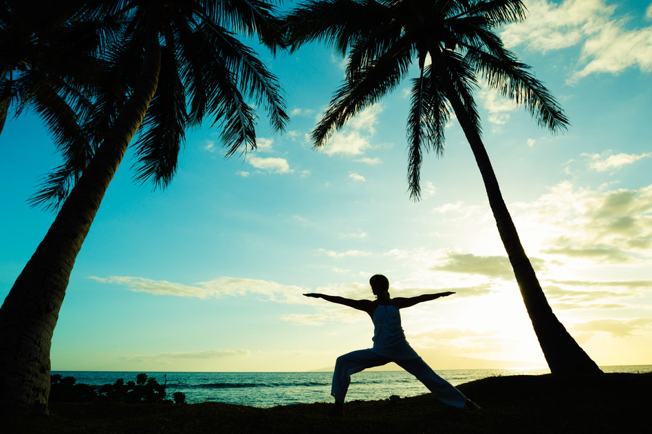 Woman Doing Yoga at Sunset